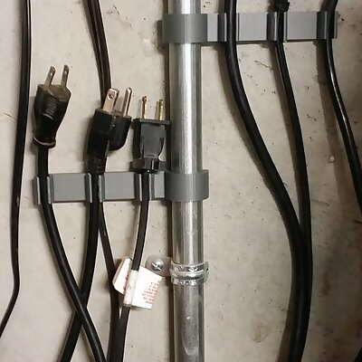 Power cable holder for conduit based wiring