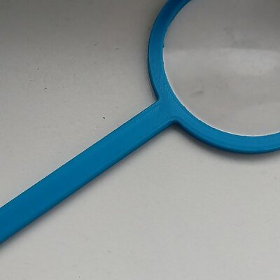 Magnifying glass holder