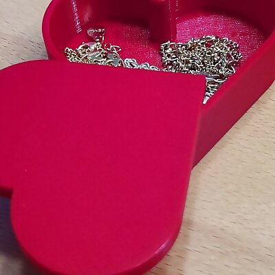 Heart shaped box with magnetic latch